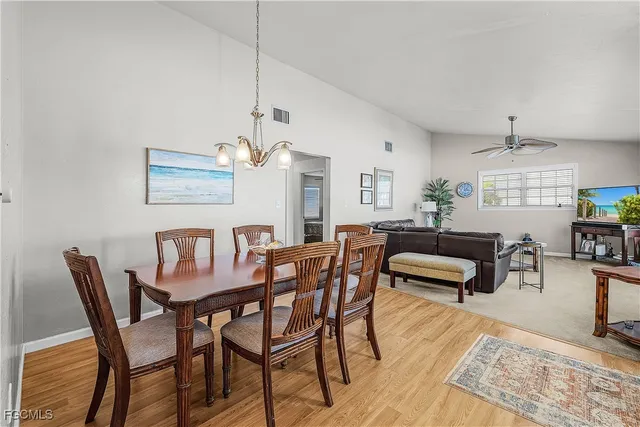a view of a dining room with furniture