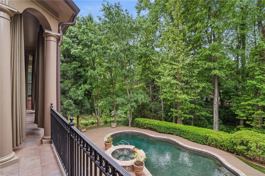 8340 Colonial Place Duluth, GA 30097 - Photo 31 of 74 a view of balcony with yard and outdoor seating
