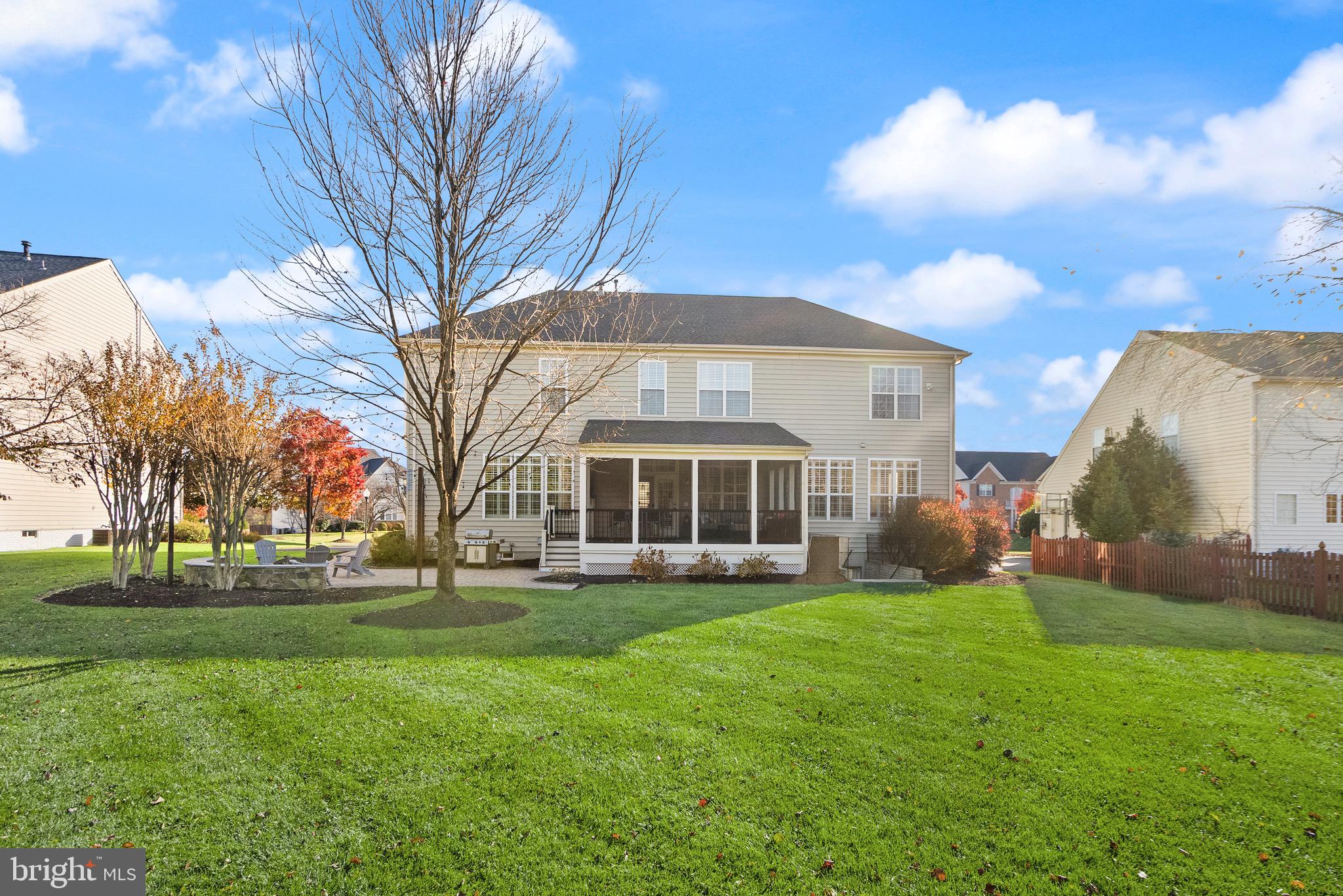22473 Terra Rosa Place Ashburn, VA 20148 - Photo 11 of 17 a view of a house with a yard