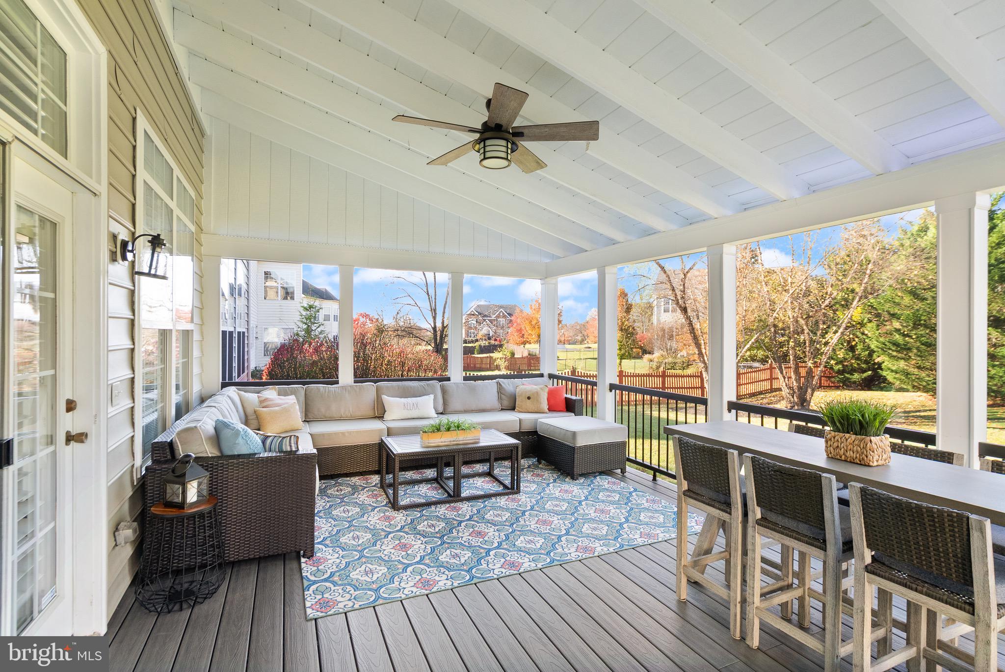 22473 Terra Rosa Place Ashburn, VA 20148 - Photo 6 of 17 a living room with furniture and a large window