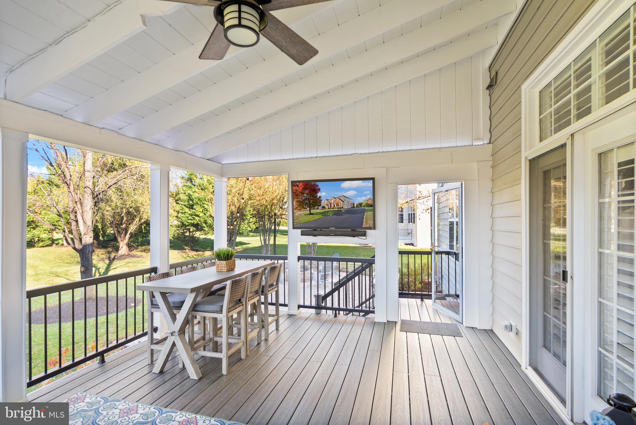 22473 Terra Rosa Place Ashburn, VA 20148 - Photo 7 of 17 a view of a dining room with furniture window and wooden floor