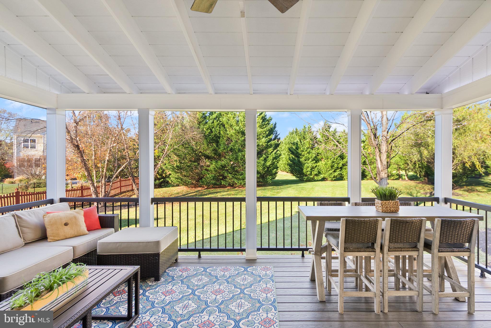 22473 Terra Rosa Place Ashburn, VA 20148 - Photo 8 of 17 a living room with furniture and a large window
