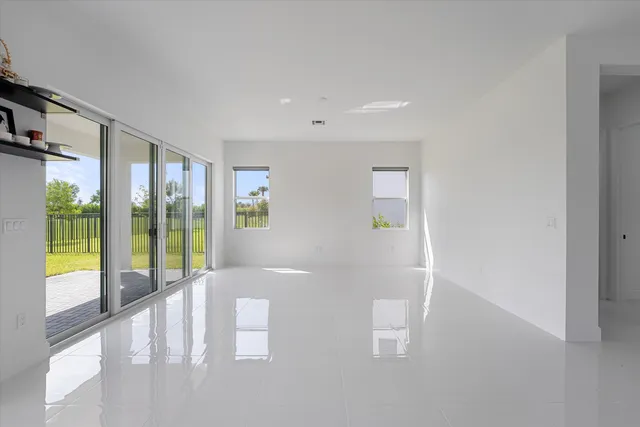 a bathroom with a shower and a sink
