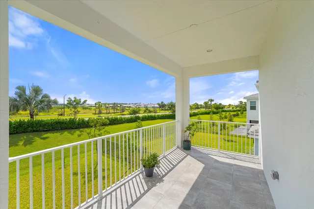 an aerial view of a house with a swimming pool