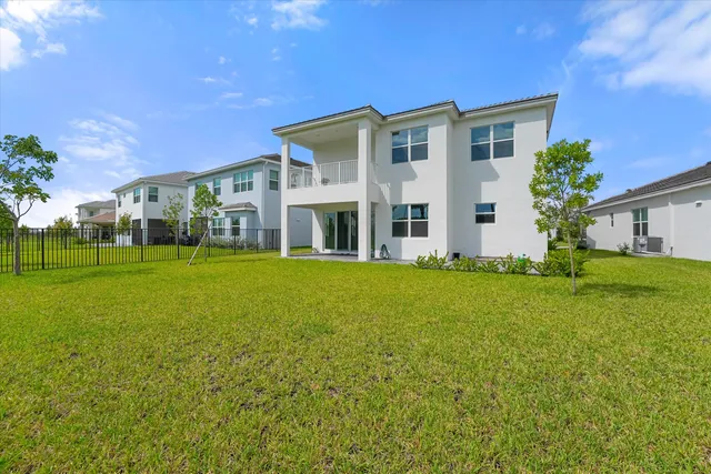 a view of a park with swings and slides