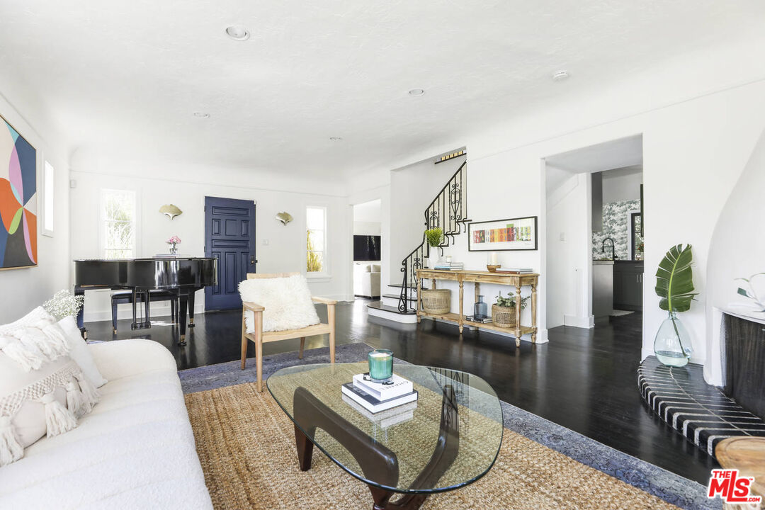 3003 Fall Avenue Los Angeles, CA 90026 - Photo 11 of 45 a living room with furniture and wooden floor