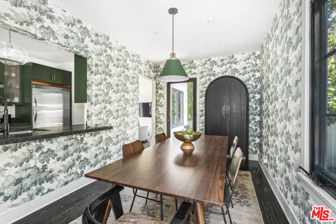 3003 Fall Avenue Los Angeles, CA 90026 - Photo 12 of 45 a view of a dining room with furniture window and wooden floor