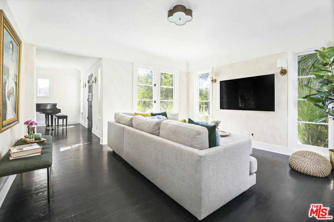 3003 Fall Avenue Los Angeles, CA 90026 - Photo 20 of 45 a living room with furniture and a flat screen tv