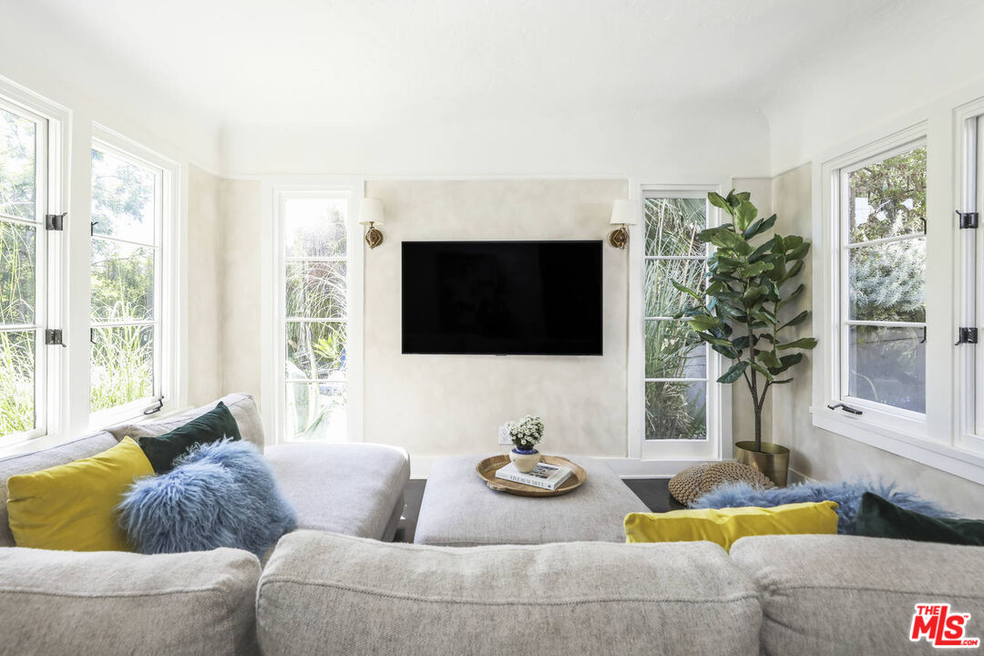 3003 Fall Avenue Los Angeles, CA 90026 - Photo 21 of 45 a living room with furniture and a flat screen tv