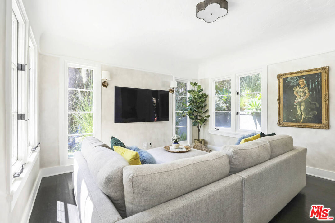 3003 Fall Avenue Los Angeles, CA 90026 - Photo 22 of 45 a living room with furniture and a large window