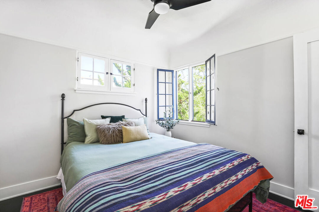 3003 Fall Avenue Los Angeles, CA 90026 - Photo 24 of 45 a bedroom with a bed and a window