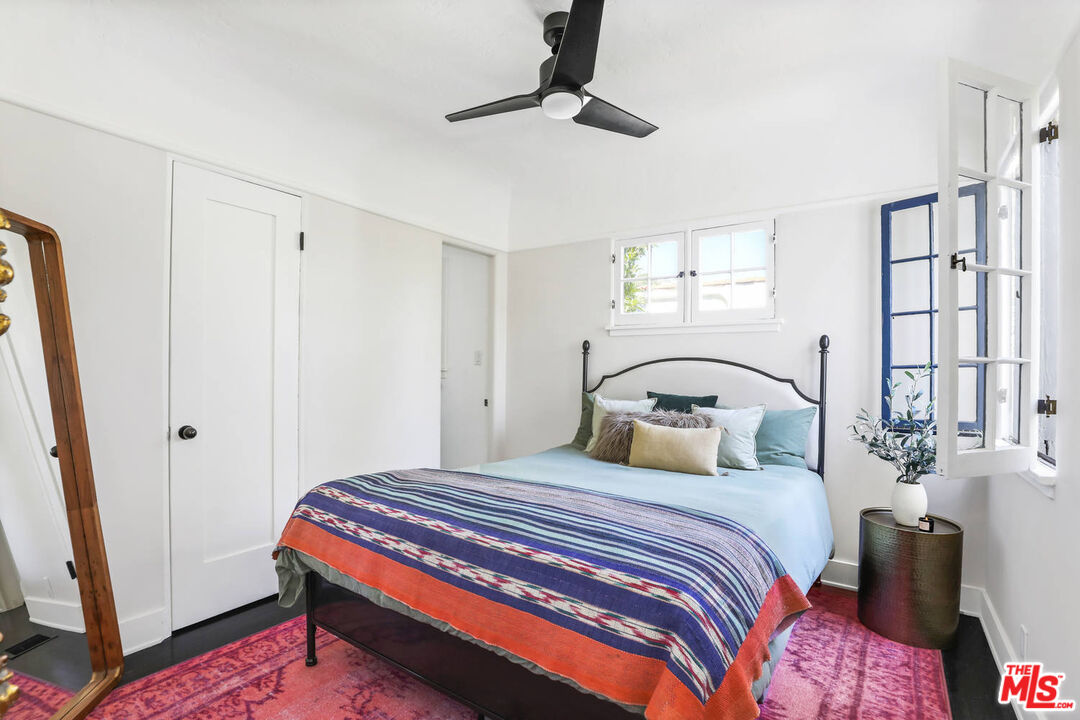 3003 Fall Avenue Los Angeles, CA 90026 - Photo 25 of 45 a bedroom with a large bed and a window