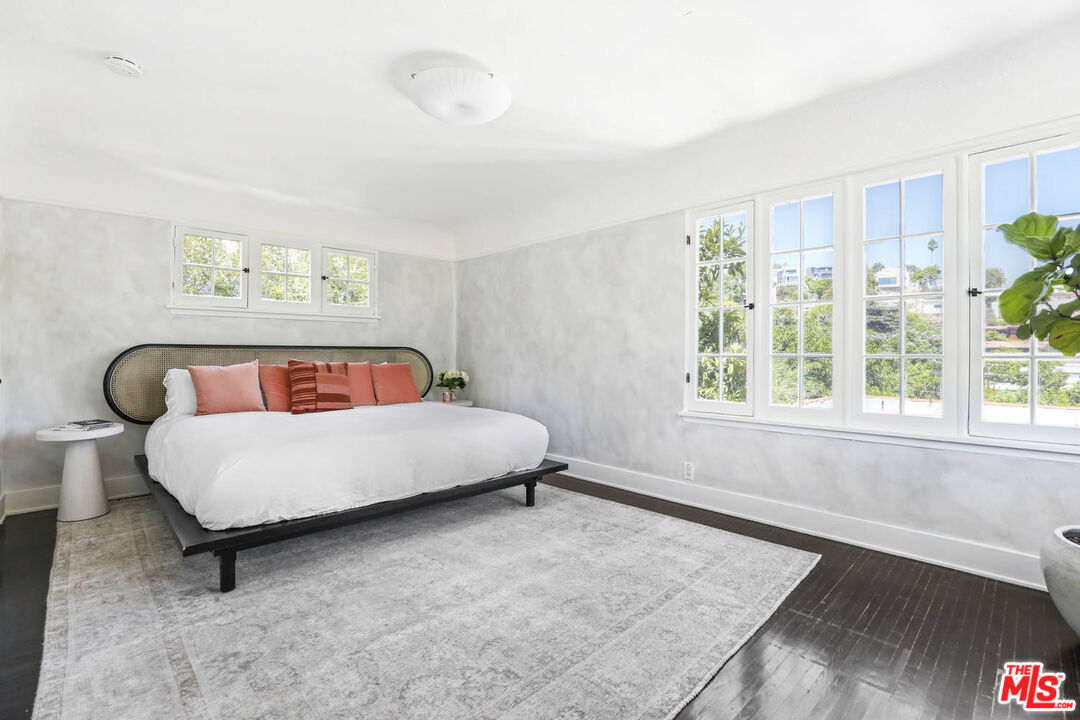 3003 Fall Avenue Los Angeles, CA 90026 - Photo 28 of 45 a bedroom with a bed and window