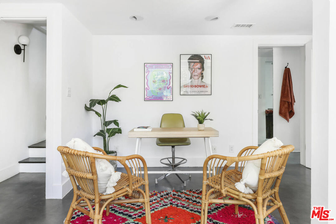 3003 Fall Avenue Los Angeles, CA 90026 - Photo 37 of 45 a dining room with furniture and wooden floor