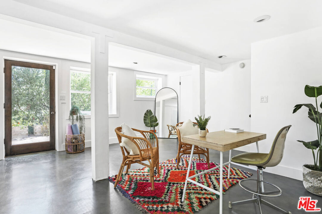 3003 Fall Avenue Los Angeles, CA 90026 - Photo 38 of 45 a view of a dining room with furniture window and wooden floor