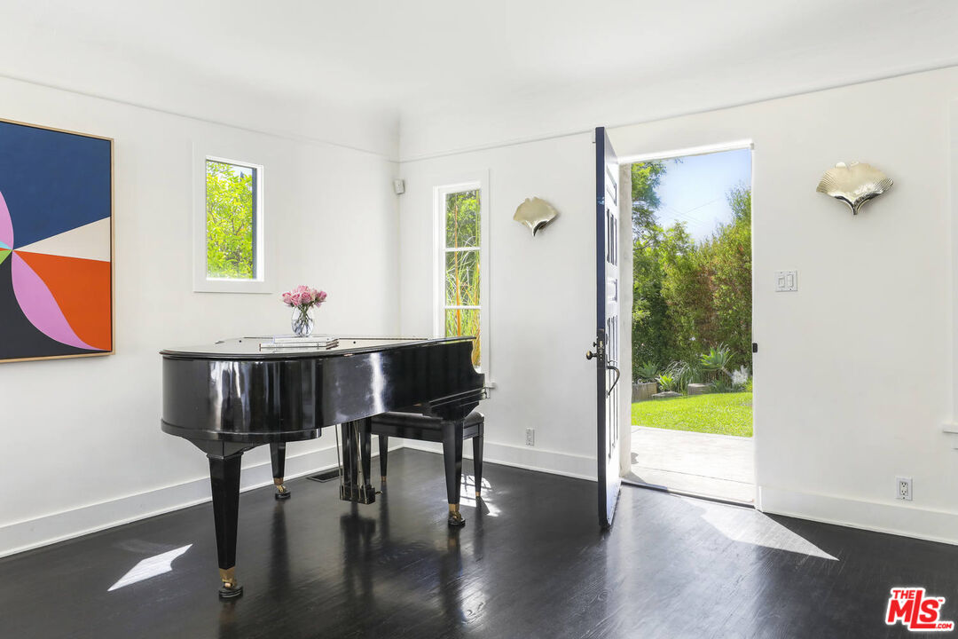 3003 Fall Avenue Los Angeles, CA 90026 - Photo 9 of 45 a view of a dining room with furniture and wooden floor
