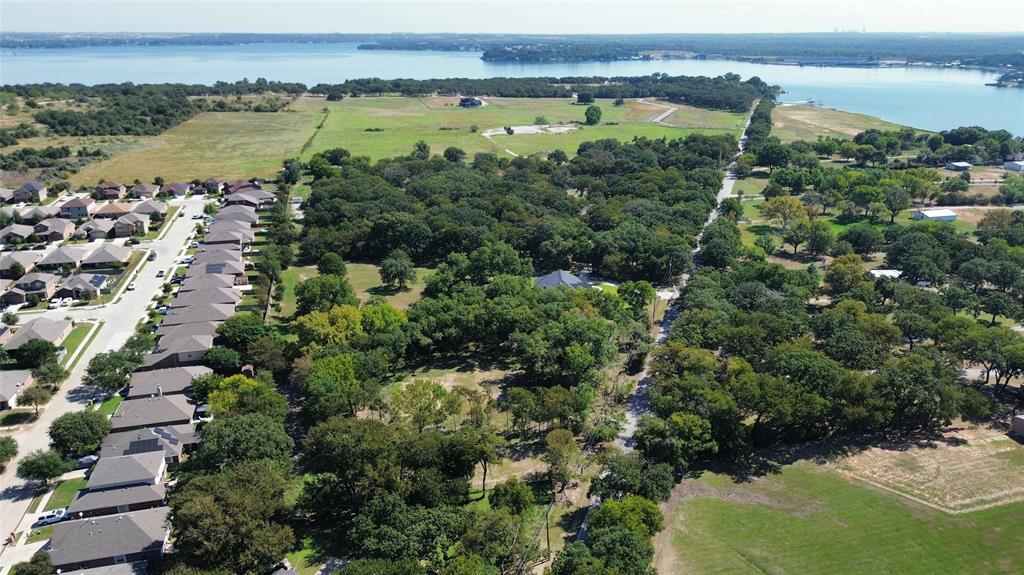 1325 Park Street Azle, TX 76020 - Photo 2 of 22 an aerial view of a houses with a lake view