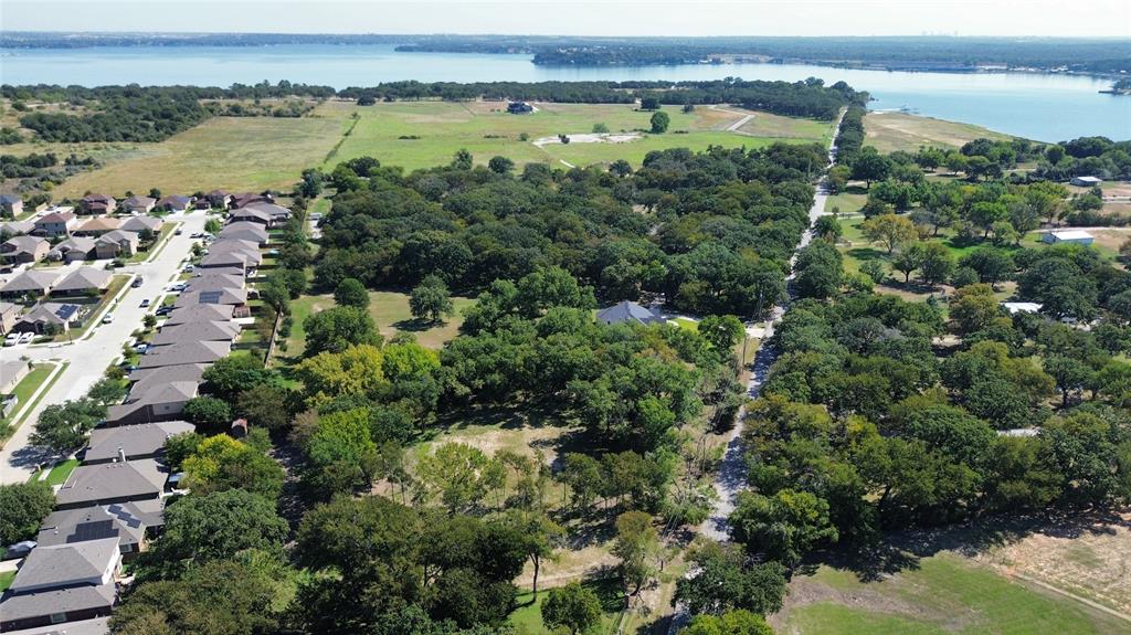 1325 Park Street Azle, TX 76020 - Photo 3 of 22 an aerial view of a houses with a lake view