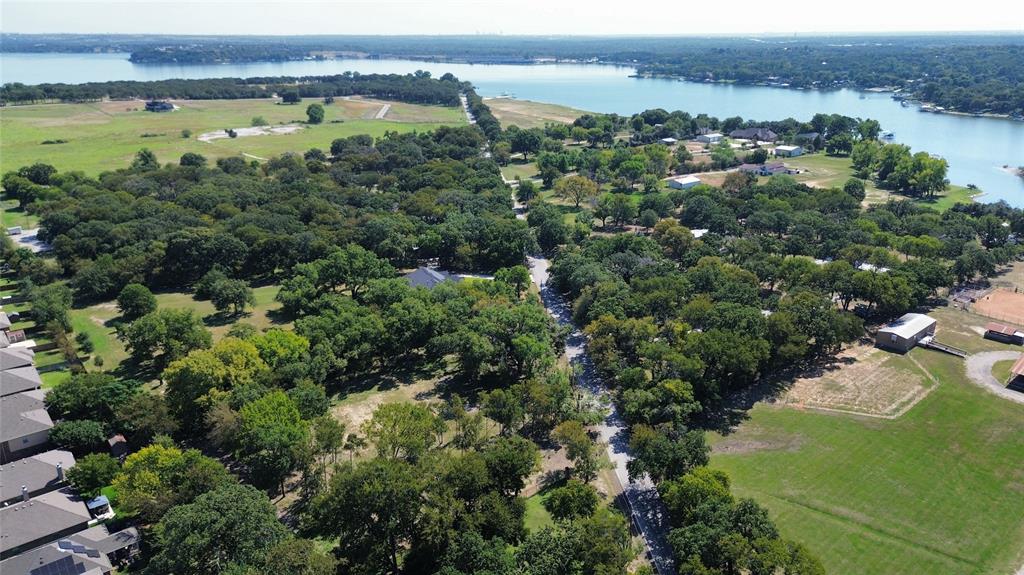 1325 Park Street Azle, TX 76020 - Photo 4 of 22 an aerial view of a houses with a lake view