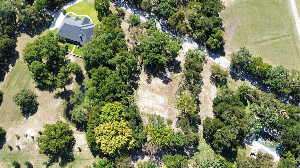 1325 Park Street Azle, TX 76020 - Photo 5 of 22 an aerial view of a house with a yard and garden