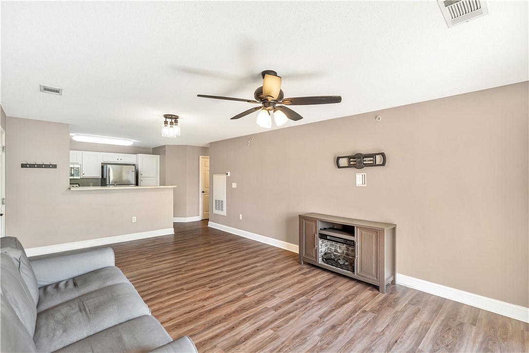 726 Lookover Drive Anderson, SC 29621 - Photo 15 of 32 This inviting living area boasts rich hardwood flooring and a functional kitchen pass-through.