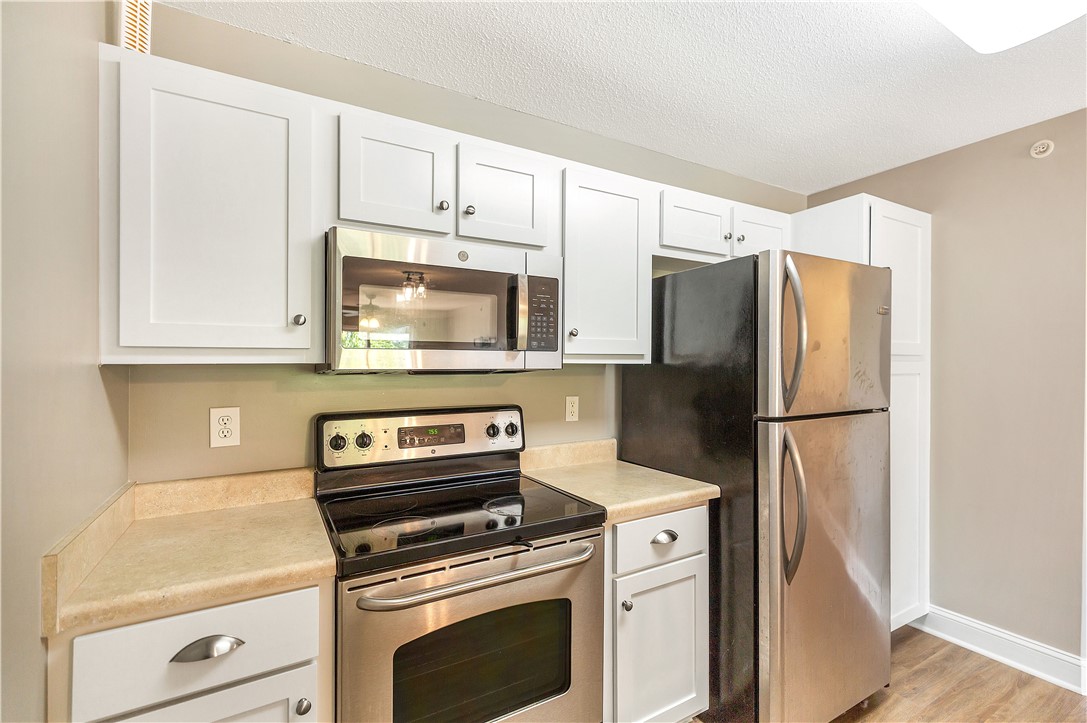 726 Lookover Drive Anderson, SC 29621 - Photo 20 of 32 This modern kitchen features essential appliances and ample cabinetry.