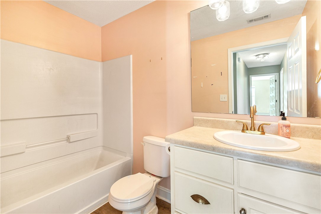 726 Lookover Drive Anderson, SC 29621 - Photo 24 of 32 This bathroom features a functional vanity with ample counter space and an integrated sink.