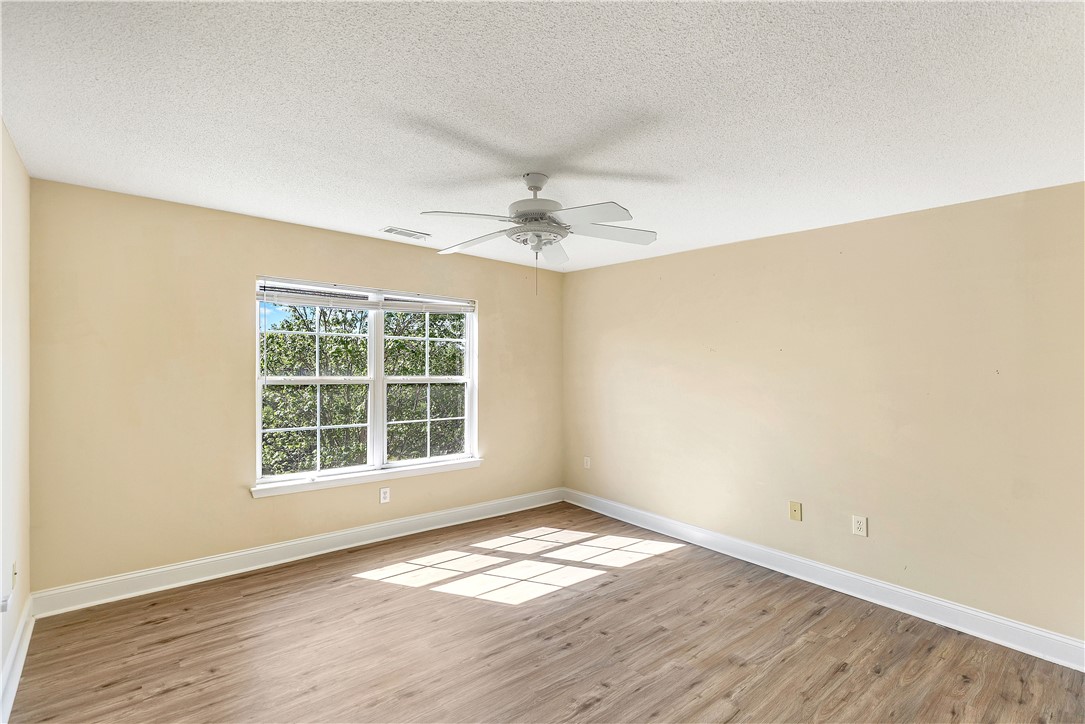 726 Lookover Drive Anderson, SC 29621 - Photo 27 of 32 This spacious room features ample natural light and durable flooring, offering a comfortable living space.