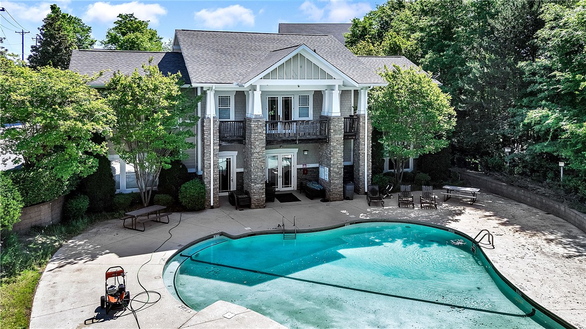 726 Lookover Drive Anderson, SC 29621 - Photo 6 of 32 This charming residence features a sparkling pool and inviting outdoor spaces for recreation and relaxation.