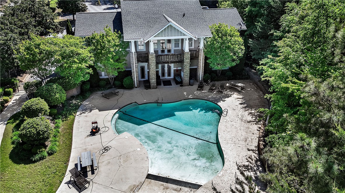 726 Lookover Drive Anderson, SC 29621 - Photo 7 of 32 An aerial view showcases a house with a private pool, surrounded by lush trees.