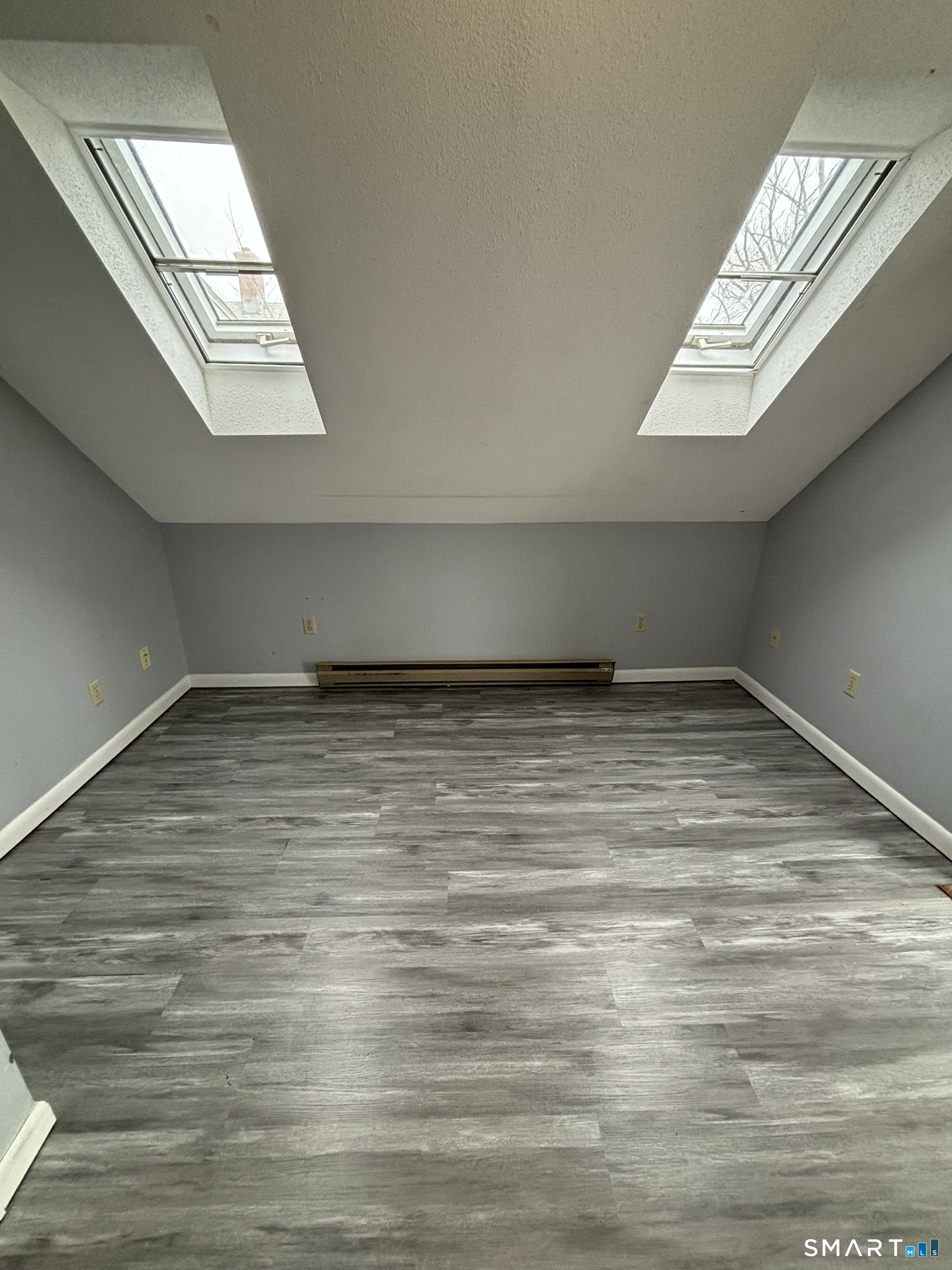 11 Roberts Street, Unit 3 Bristol, CT 06010 - Photo 4 of 11 a view of an empty room