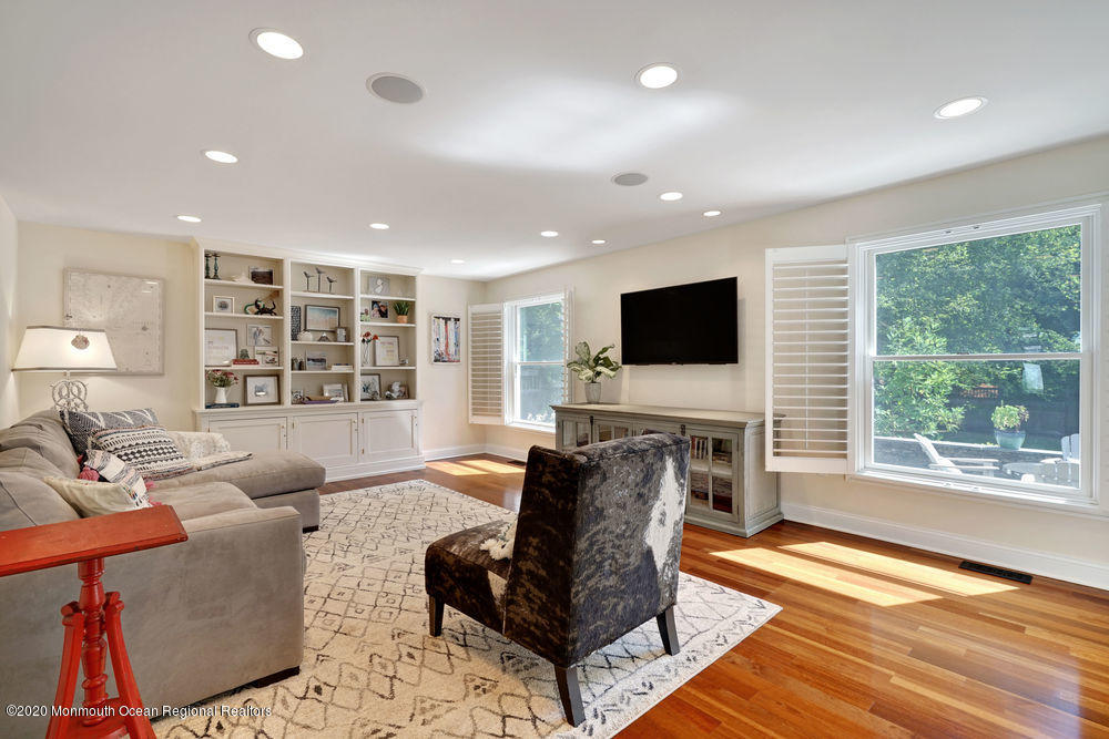 27 Southern Way Princeton, NJ 08540 - Photo 15 of 63 a living room with furniture and a flat screen tv