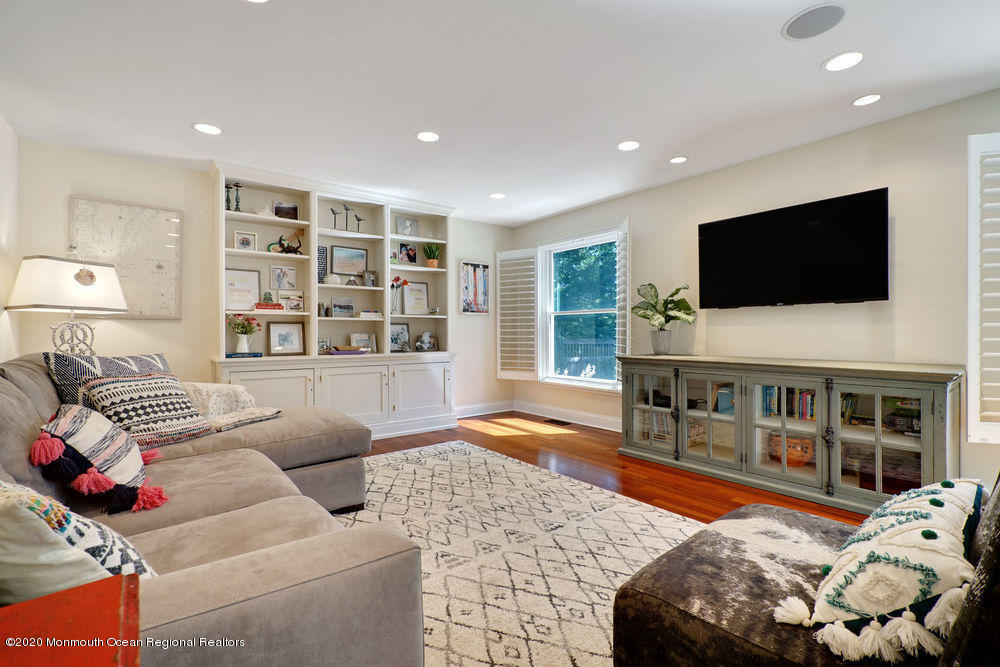 27 Southern Way Princeton, NJ 08540 - Photo 16 of 63 a living room with furniture and a flat screen tv