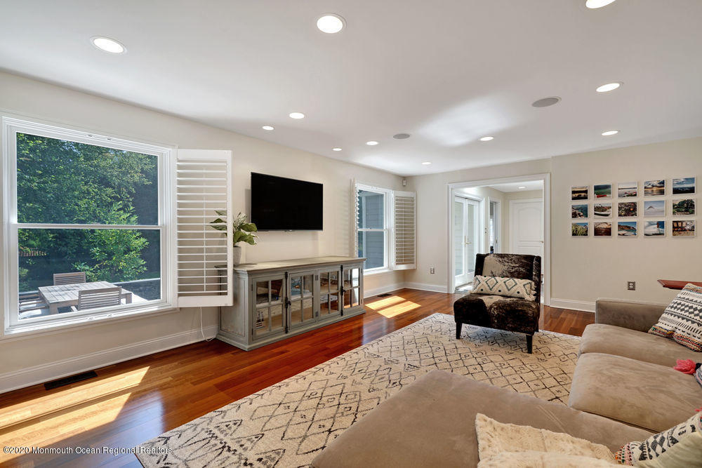 27 Southern Way Princeton, NJ 08540 - Photo 18 of 63 a living room with furniture and a flat screen tv