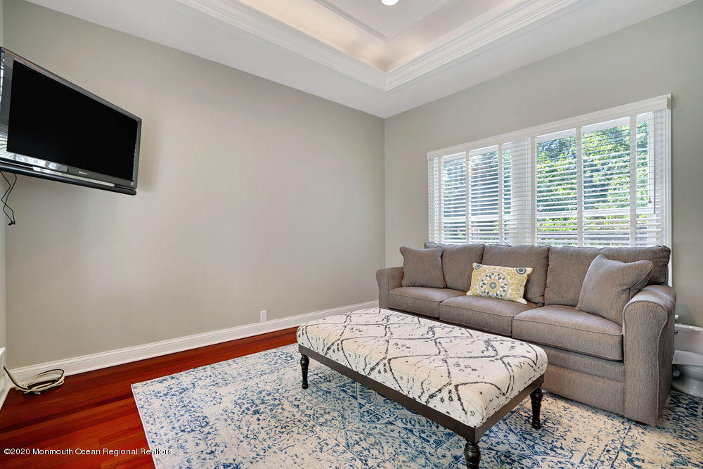 27 Southern Way Princeton, NJ 08540 - Photo 23 of 63 a living room with furniture and a flat screen tv