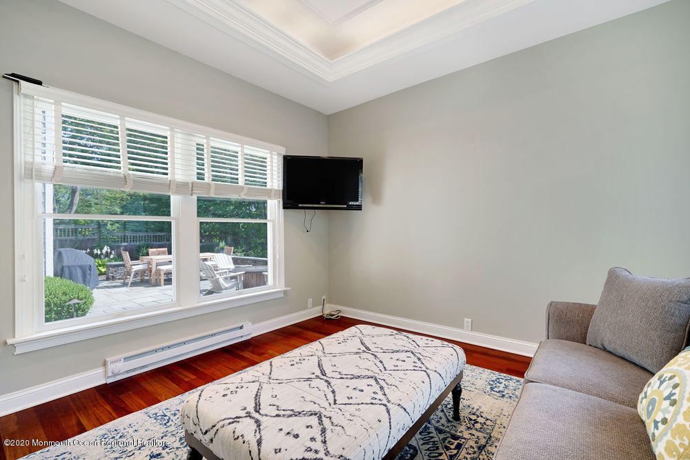 27 Southern Way Princeton, NJ 08540 - Photo 25 of 63 a bedroom with a bed and flat screen tv