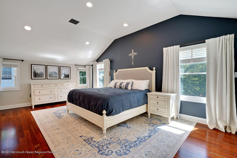 27 Southern Way Princeton, NJ 08540 - Photo 28 of 63 a bedroom with a bed and wooden floor