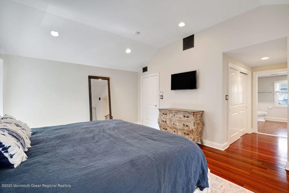 27 Southern Way Princeton, NJ 08540 - Photo 31 of 63 a bedroom with a bed and a flat screen tv