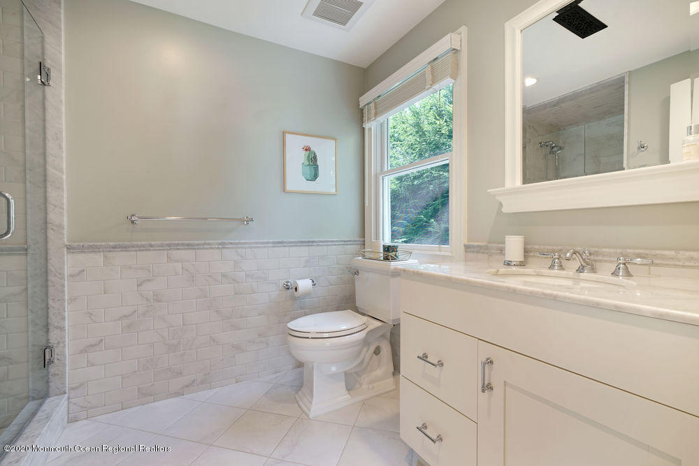 27 Southern Way Princeton, NJ 08540 - Photo 35 of 63 a bathroom with a sink toilet and a window