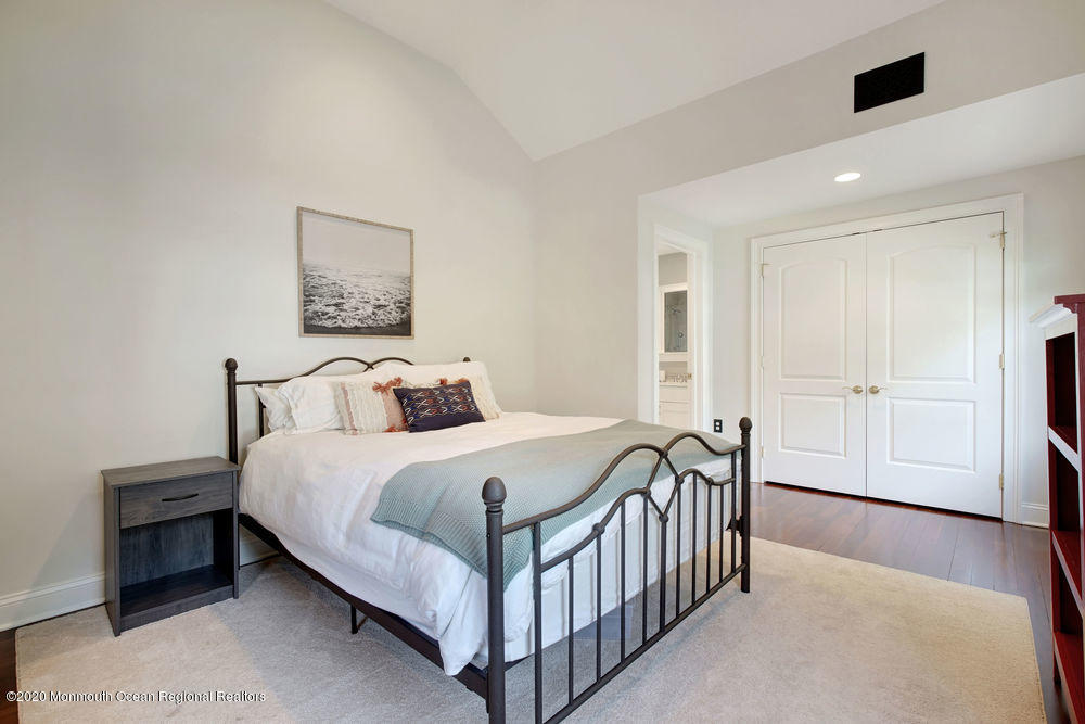 27 Southern Way Princeton, NJ 08540 - Photo 37 of 63 a bedroom with a bed and a night stand