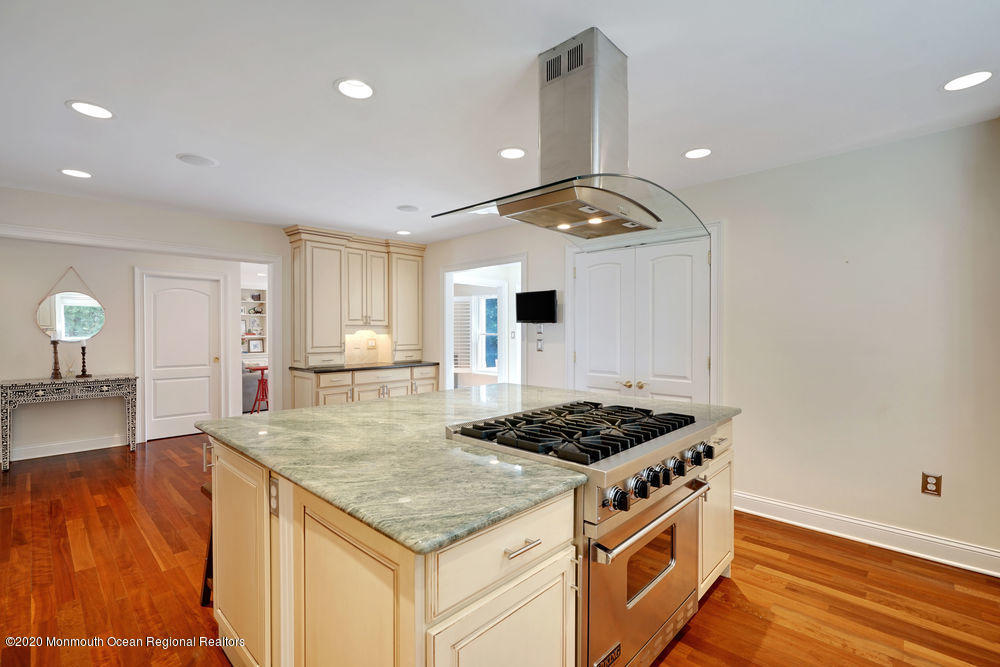 27 Southern Way Princeton, NJ 08540 - Photo 9 of 63 a kitchen with stainless steel appliances granite countertop a stove and a sink