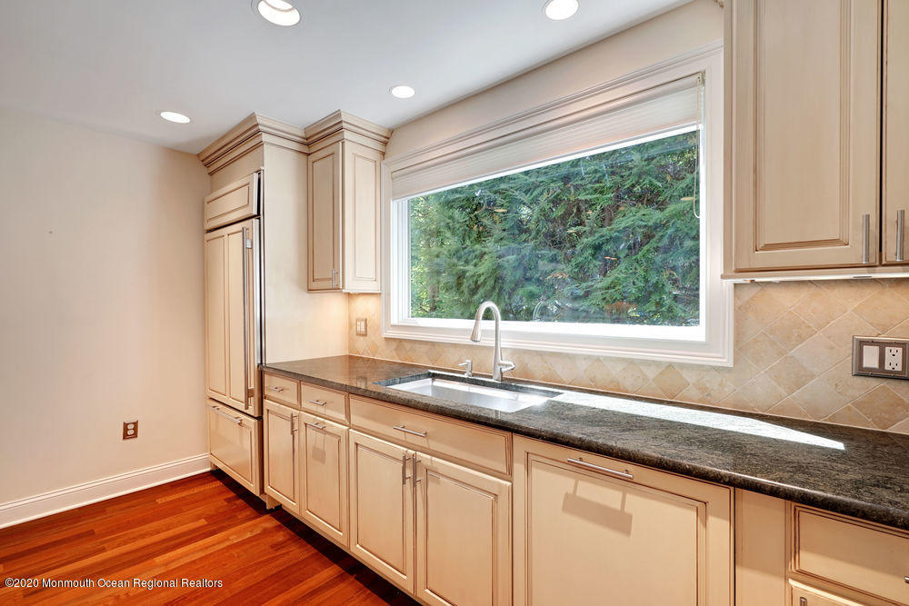 27 Southern Way Princeton, NJ 08540 - Photo 10 of 63 a kitchen with stainless steel appliances granite countertop a sink and a window