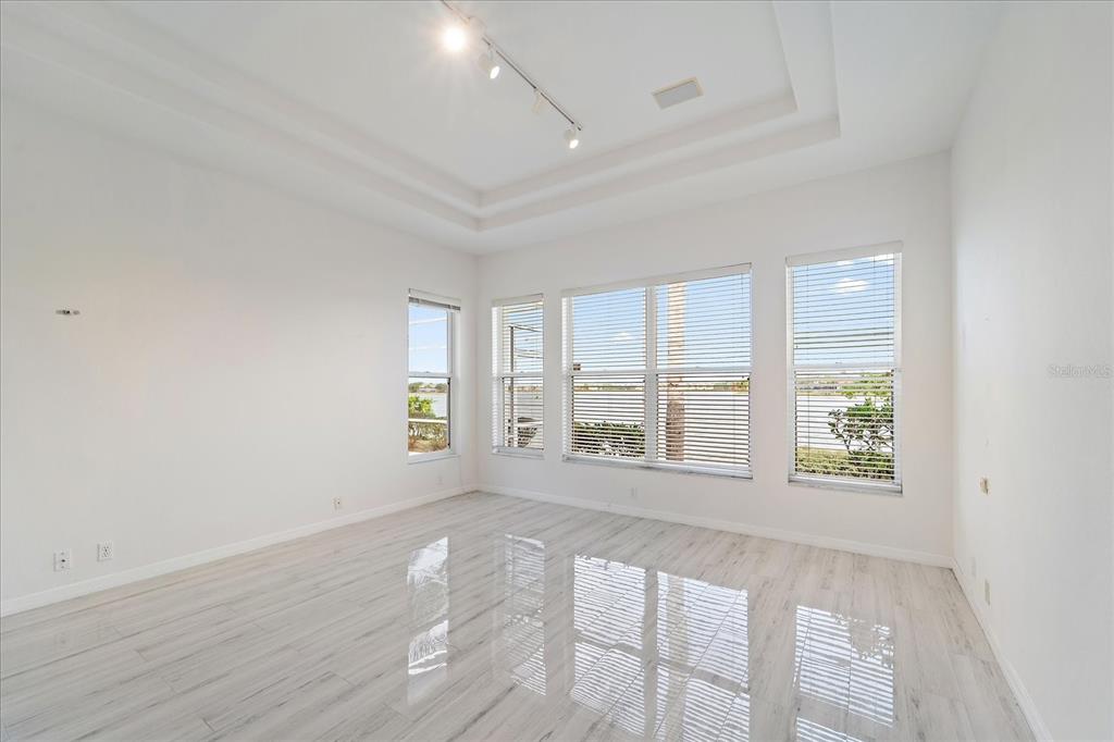 6585 Waters Edge Way Lakewood Ranch, FL 34202 - Photo 17 of 59 a view of an empty room with a window