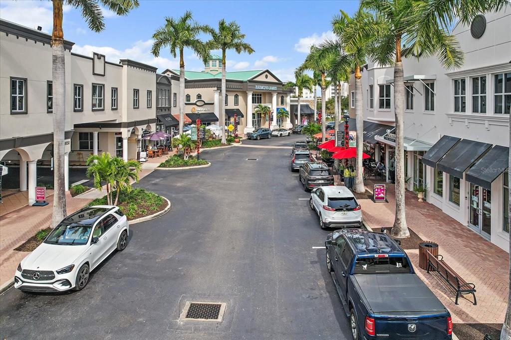 6585 Waters Edge Way Lakewood Ranch, FL 34202 - Photo 51 of 56 a front view of a building with sitting area