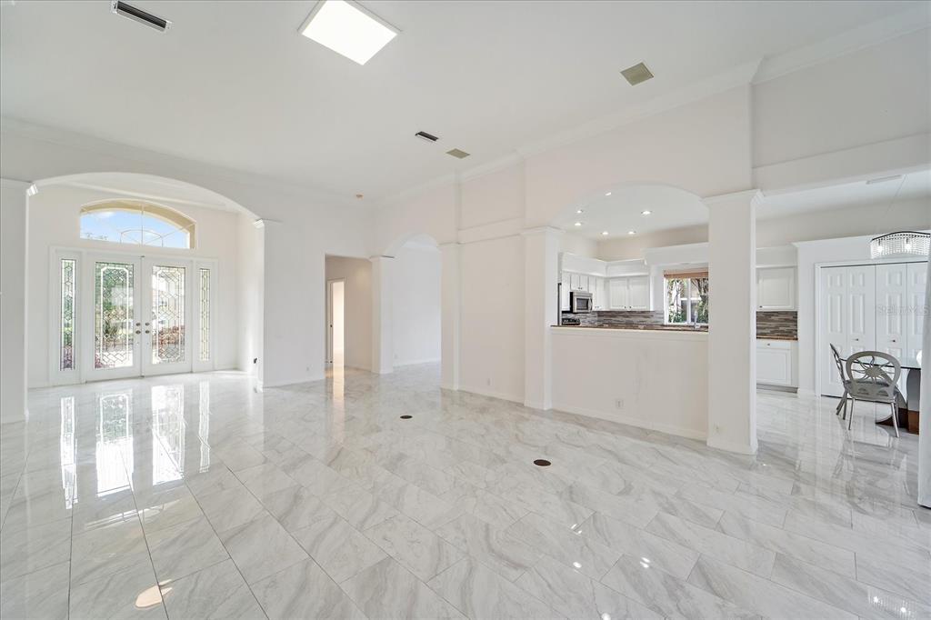 6585 Waters Edge Way Lakewood Ranch, FL 34202 - Photo 7 of 59 a view of a kitchen with a sink