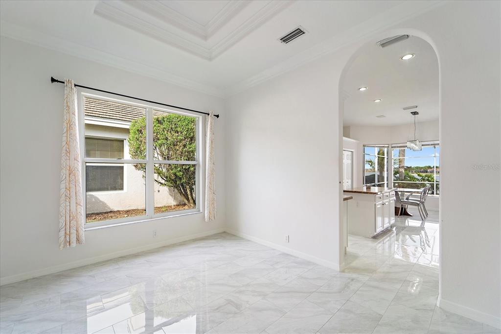 6585 Waters Edge Way Lakewood Ranch, FL 34202 - Photo 9 of 59 a view of livingroom with furniture and a window