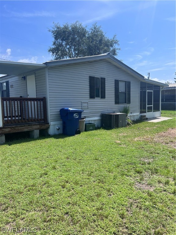 853 Reddish Circle Clewiston, FL 33440 - Photo 3 of 17 a house view with a garden space
