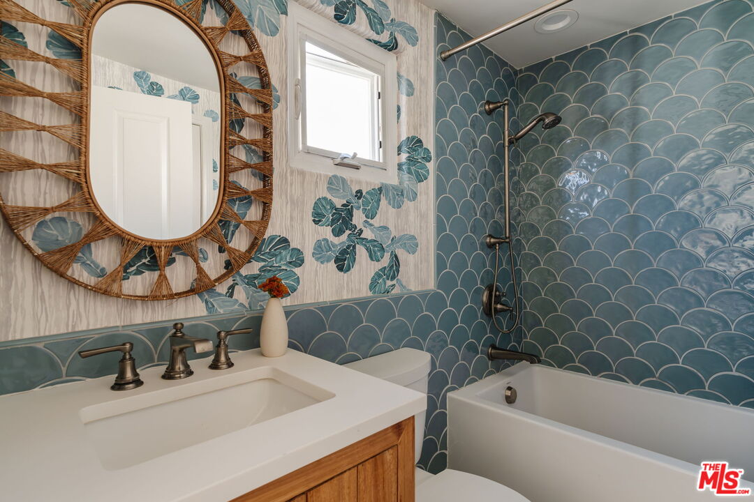 131 Galleon Street, Unit 2 Marina del Rey, CA 90292 - Photo 11 of 21 a bathroom with a sink and a mirror
