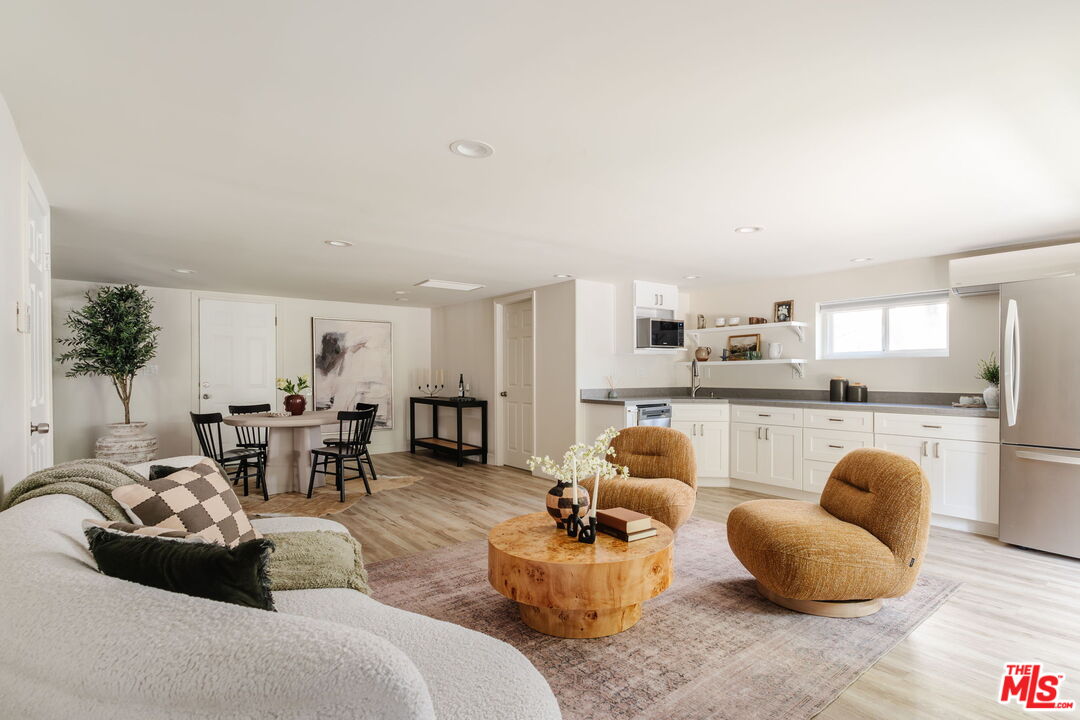 131 Galleon Street, Unit 2 Marina del Rey, CA 90292 - Photo 14 of 21 a living room with furniture and a kitchen
