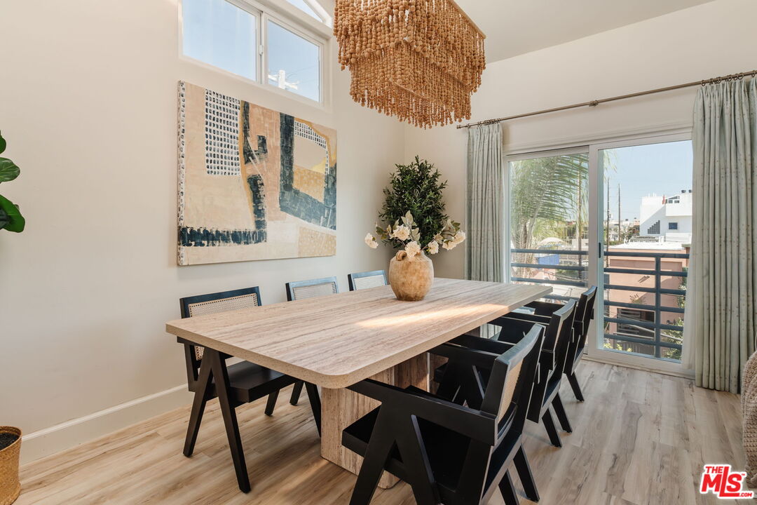 131 Galleon Street, Unit 2 Marina del Rey, CA 90292 - Photo 3 of 21 a view of a dining room with furniture and wooden floor